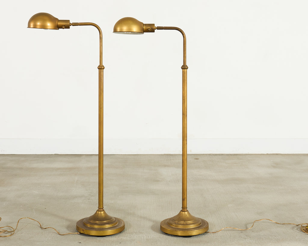 Pair of Patinated Brass Adjustable Pharmacy Floor Lamps