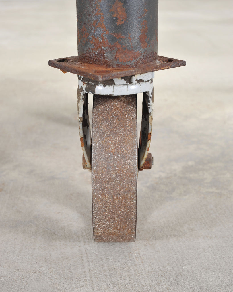 Industrial Style Round Machined Iron Center Table on Casters