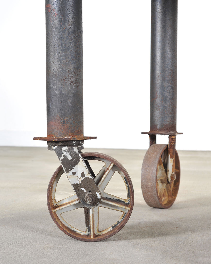 Industrial Style Round Machined Iron Center Table on Casters