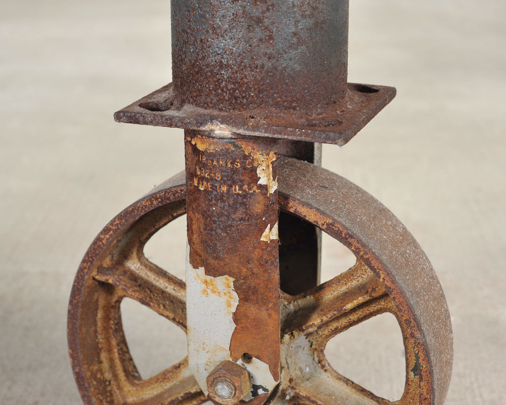 Industrial Style Round Machined Iron Center Table on Casters