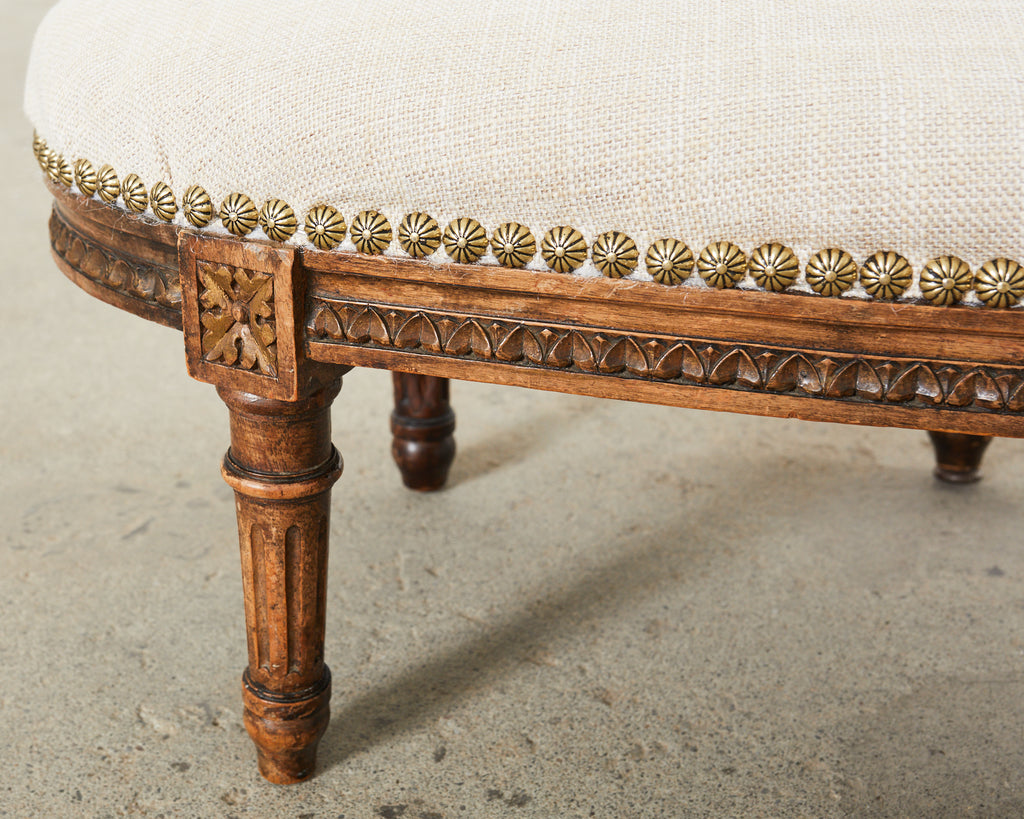 19th Century French Louis XVI Walnut Six Leg Oval Footstool