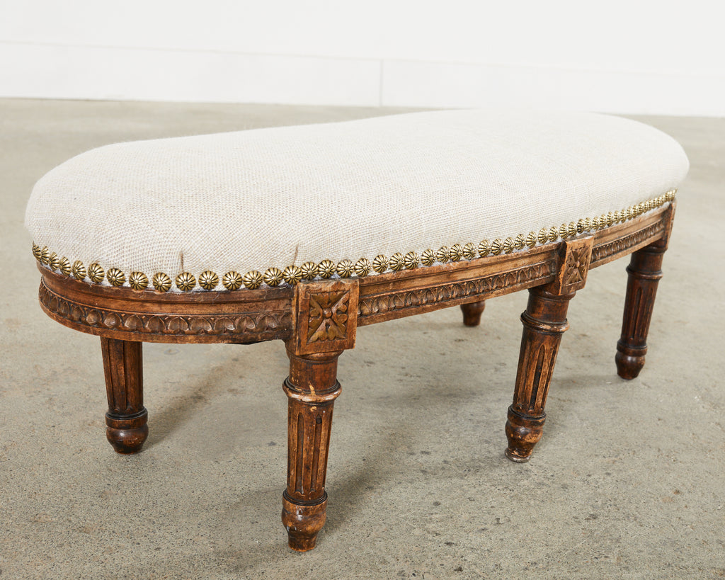 19th Century French Louis XVI Walnut Six Leg Oval Footstool