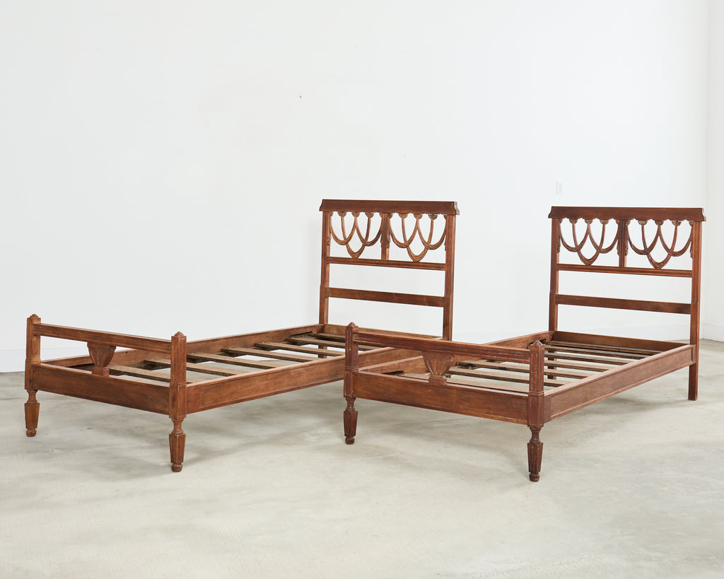 Pair of Italian Neoclassical Style Carved Bed Frames