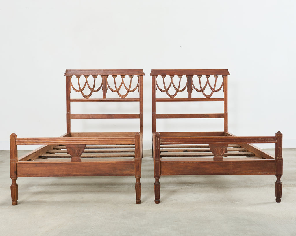 Pair of Italian Neoclassical Style Carved Bed Frames