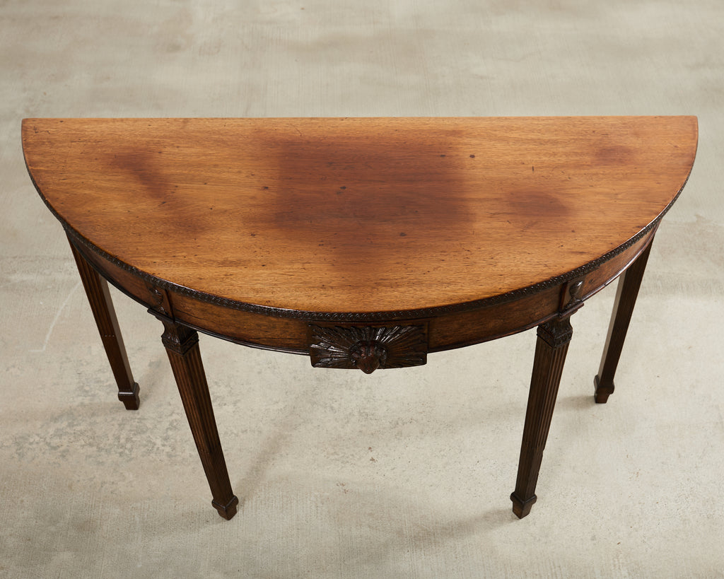 Pair of Italian Neoclassical Walnut Apollo Sunburst Demilunes