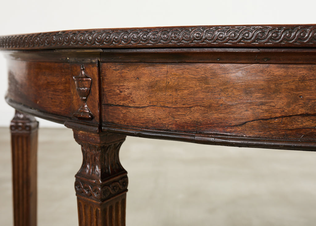 Pair of Italian Neoclassical Walnut Apollo Sunburst Demilunes