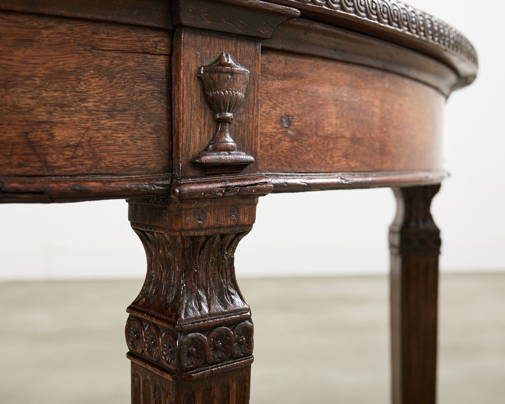 Pair of Italian Neoclassical Walnut Apollo Sunburst Demilunes