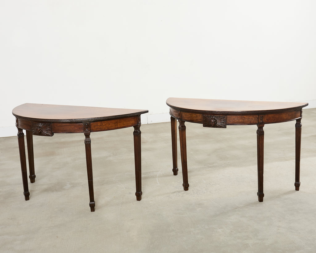 Pair of Italian Neoclassical Walnut Apollo Sunburst Demilunes