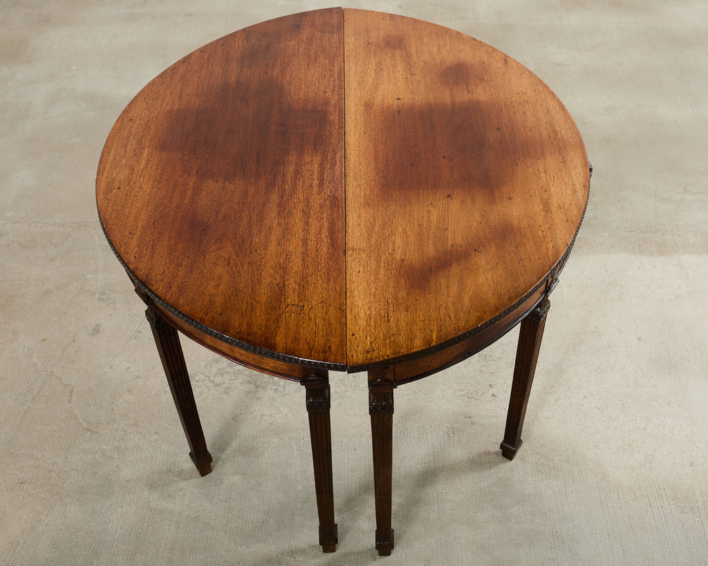 Pair of Italian Neoclassical Walnut Apollo Sunburst Demilunes