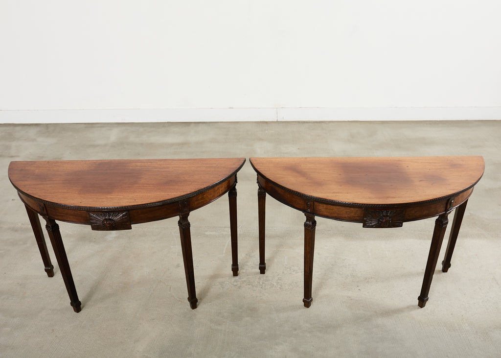 Pair of Italian Neoclassical Walnut Apollo Sunburst Demilunes