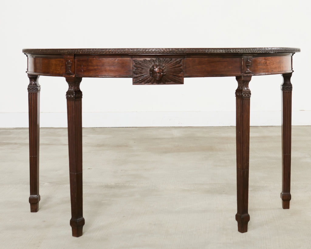 Pair of Italian Neoclassical Walnut Apollo Sunburst Demilunes