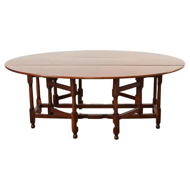 Dennis and Leen Georgian Style Drop-leaf Oval Dining Table