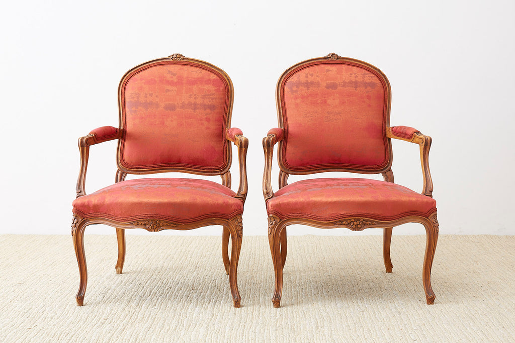 Pair of 19th Century Louis XV Carved Walnut Armchairs