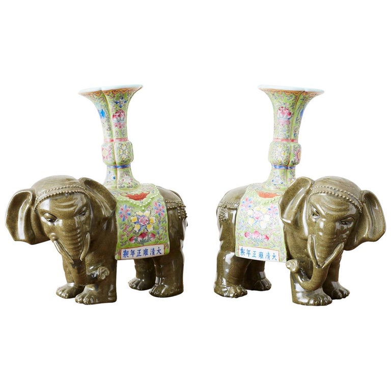 Pair of Chinese Jade Colored Porcelain Elephant Candlesticks