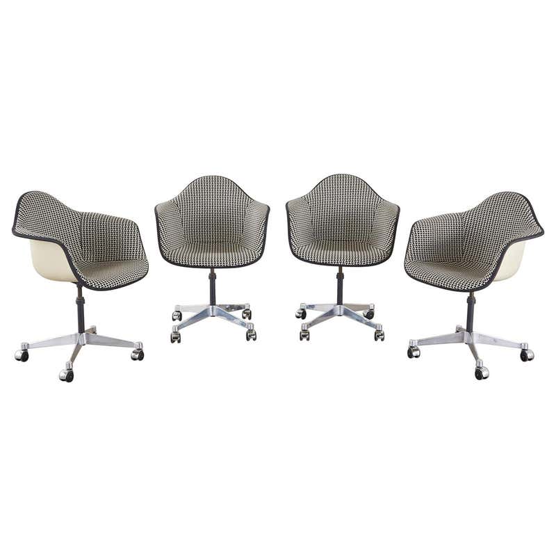 Set of Four Eames for Herman Miller Swivel Shell Chairs