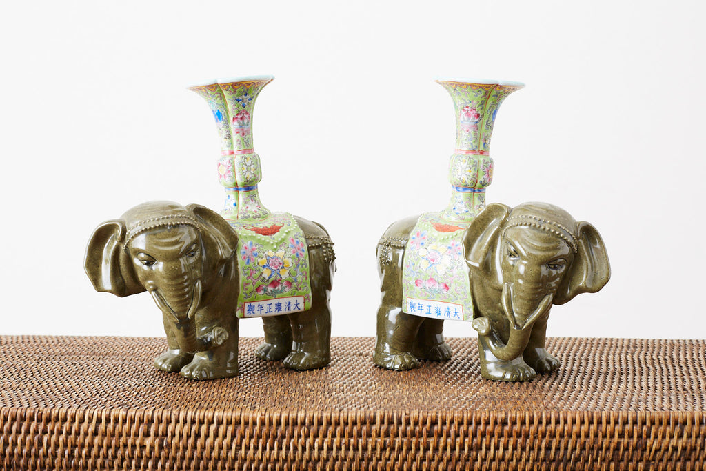 Pair of Chinese Jade Colored Porcelain Elephant Candlesticks