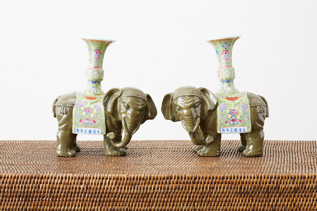 Pair of Chinese Jade Colored Porcelain Elephant Candlesticks