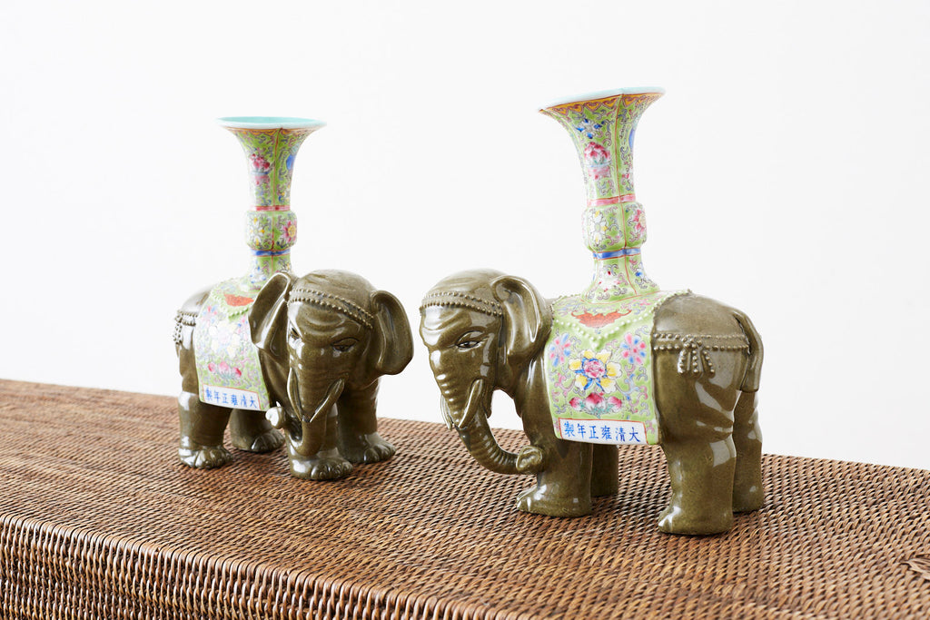 Pair of Chinese Jade Colored Porcelain Elephant Candlesticks