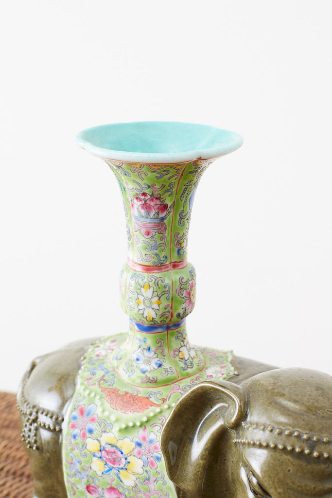 Pair of Chinese Jade Colored Porcelain Elephant Candlesticks