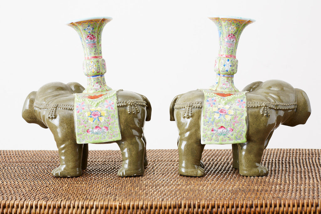 Pair of Chinese Jade Colored Porcelain Elephant Candlesticks