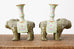 Pair of Chinese Jade Colored Porcelain Elephant Candlesticks