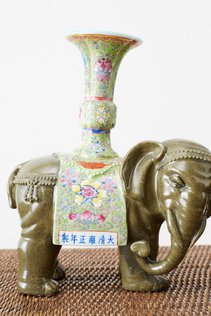 Pair of Chinese Jade Colored Porcelain Elephant Candlesticks