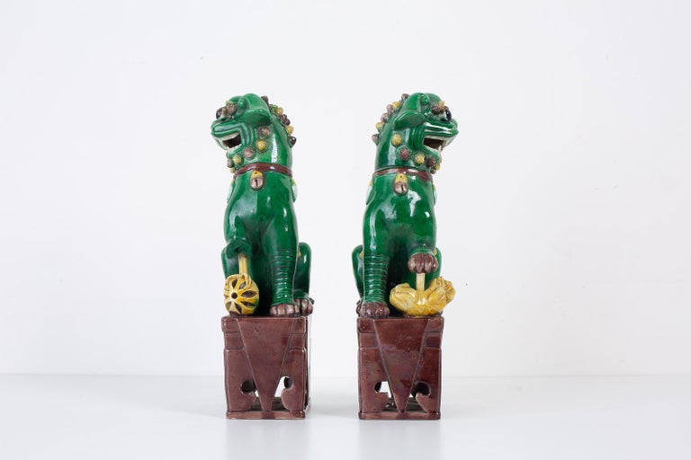 Pair of Chinese Famille Verte Foo Dogs on Stands