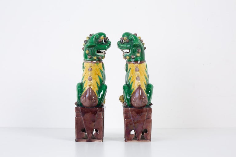 Pair of Chinese Famille Verte Foo Dogs on Stands