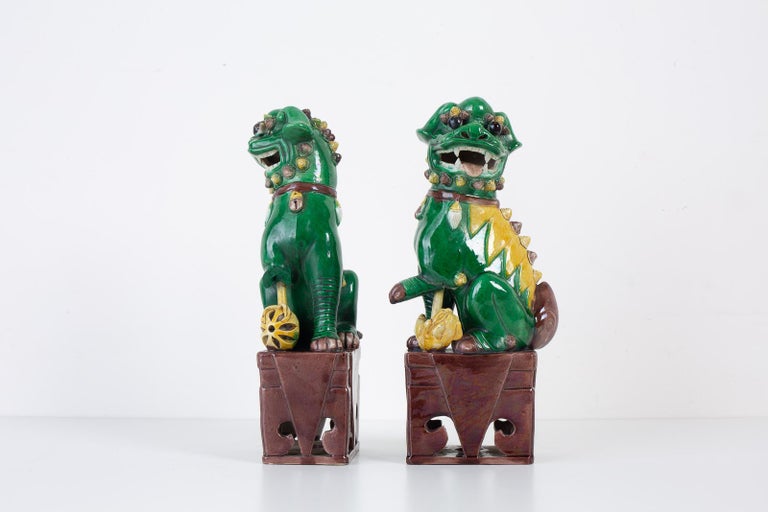 Pair of Chinese Famille Verte Foo Dogs on Stands