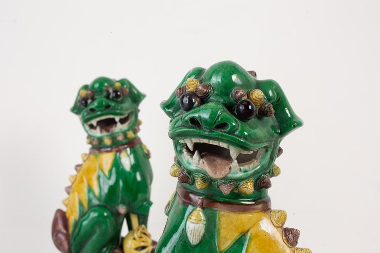 Pair of Chinese Famille Verte Foo Dogs on Stands