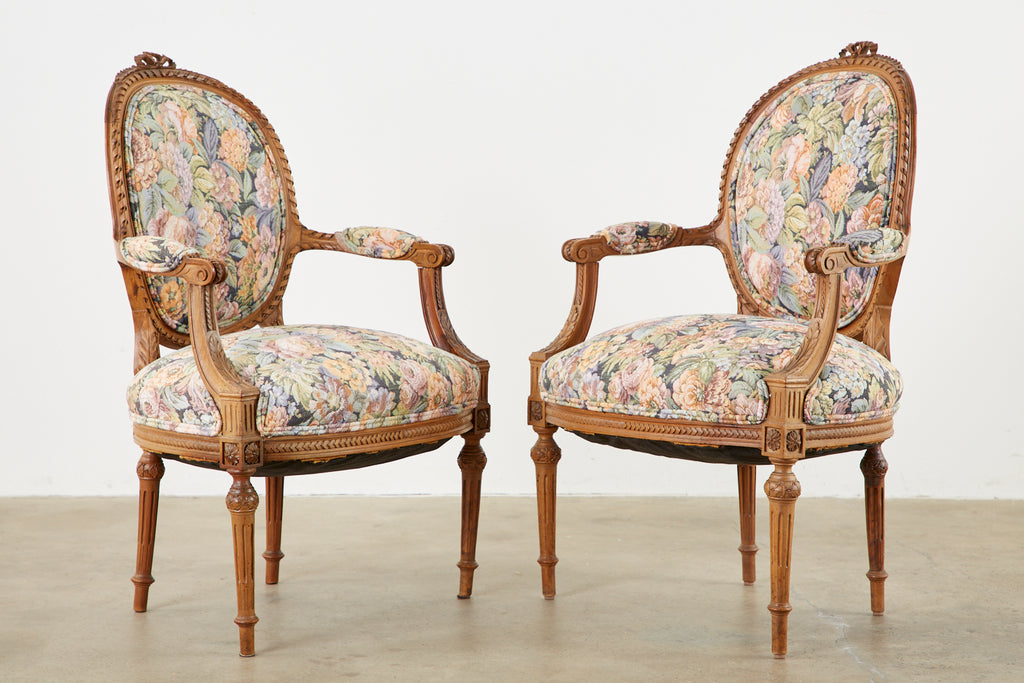 Pair of French Louis XVI Style Carved Fauteuil Armchairs