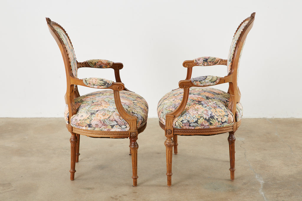 Pair of French Louis XVI Style Carved Fauteuil Armchairs