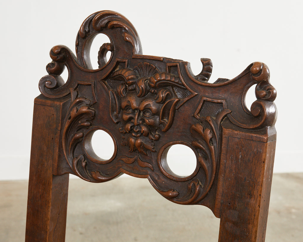 Set of Ten French Baroque Style Walnut Masked Dining Chairs