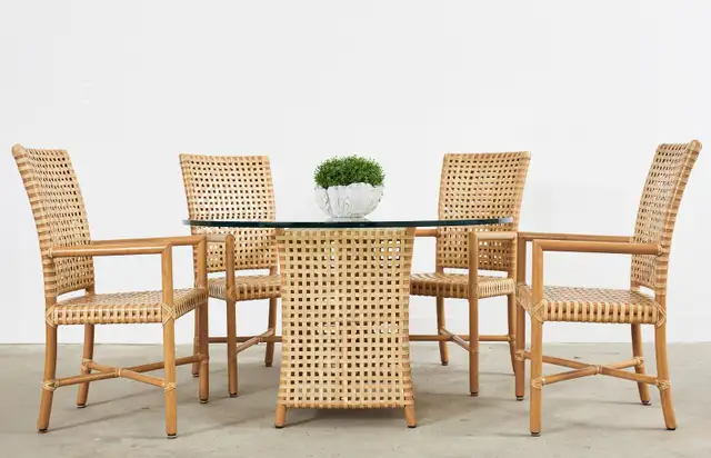 Set of Four McGuire Woven Rawhide Rattan Dining Armchairs