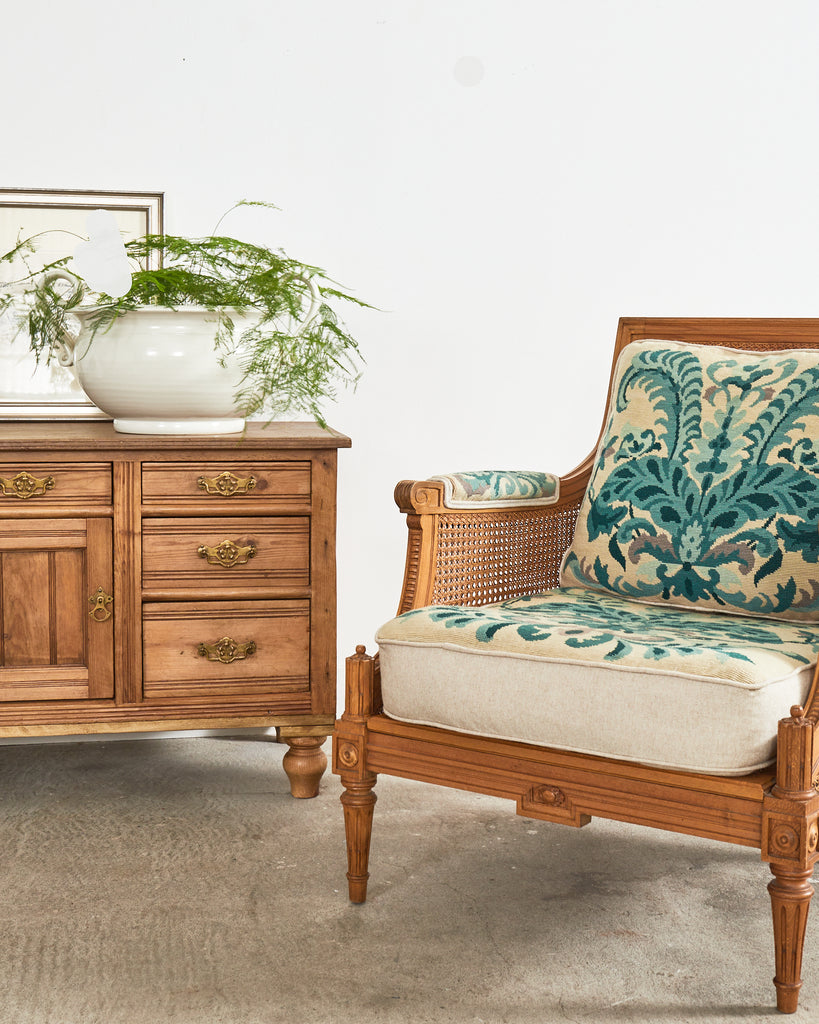 Pair of Louis XVI Style Walnut Caned Needlepoint Lounge Chairs