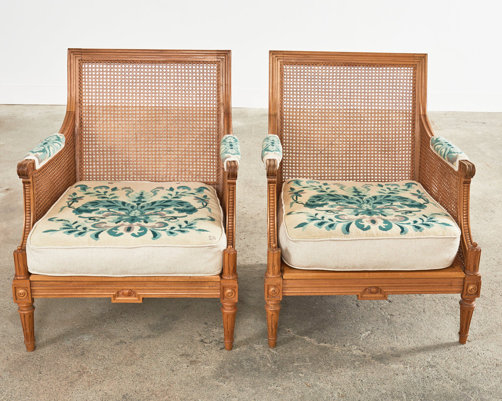 Pair of Louis XVI Style Walnut Caned Needlepoint Lounge Chairs