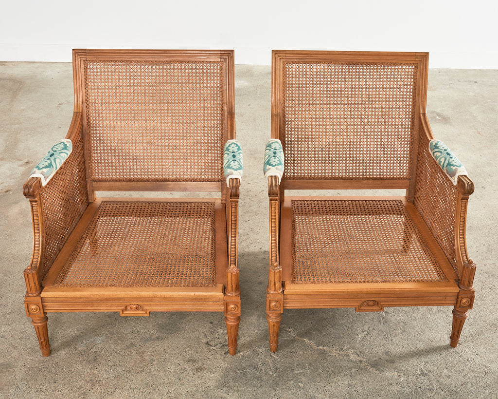Pair of Louis XVI Style Walnut Caned Needlepoint Lounge Chairs