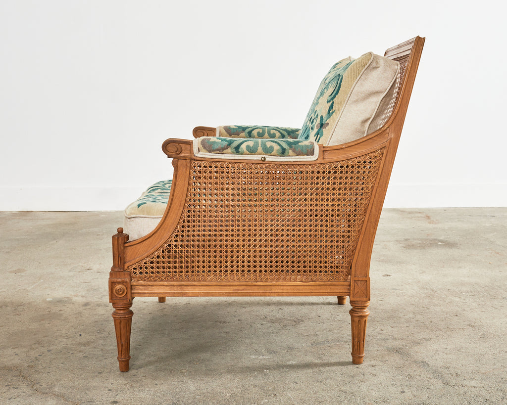 Pair of Louis XVI Style Walnut Caned Needlepoint Lounge Chairs