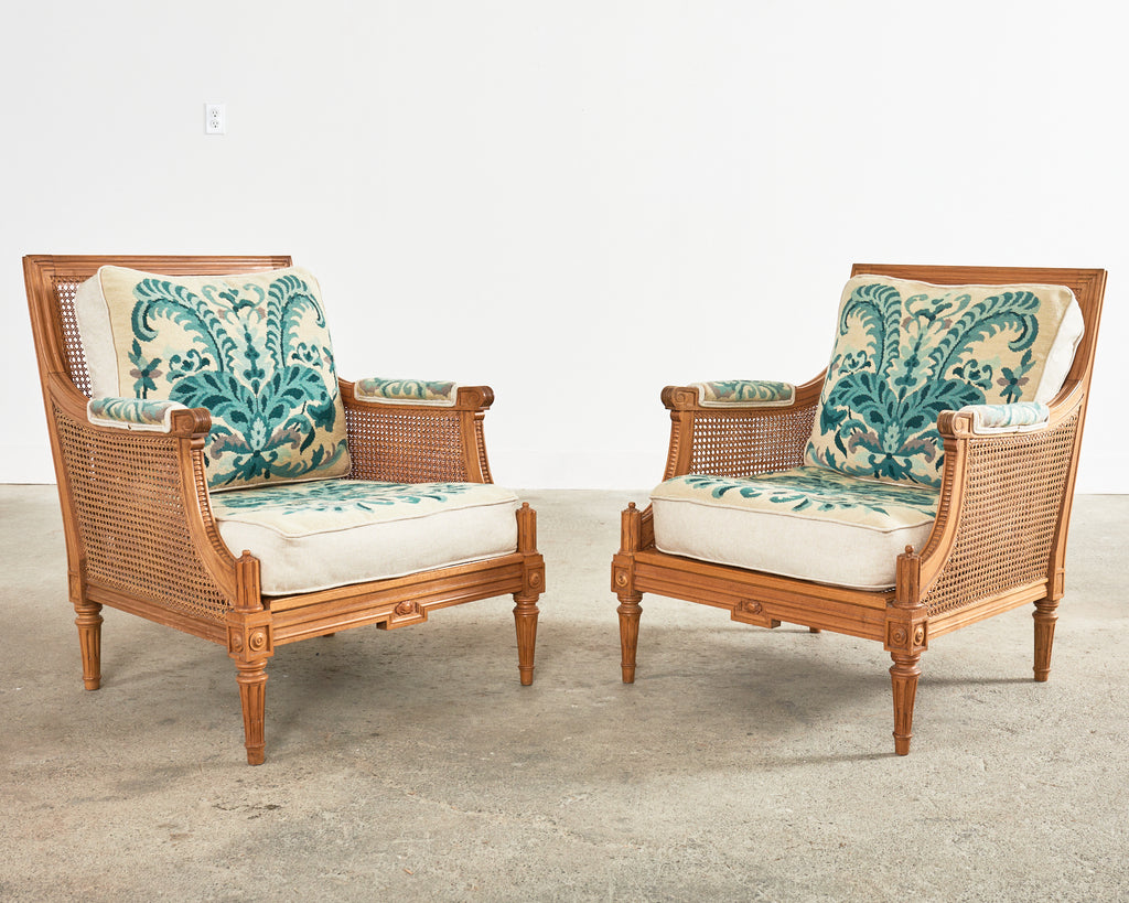 Pair of Louis XVI Style Walnut Caned Needlepoint Lounge Chairs