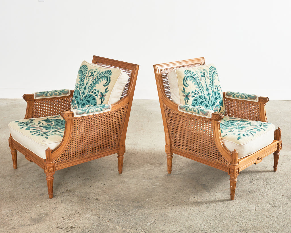 Pair of Louis XVI Style Walnut Caned Needlepoint Lounge Chairs