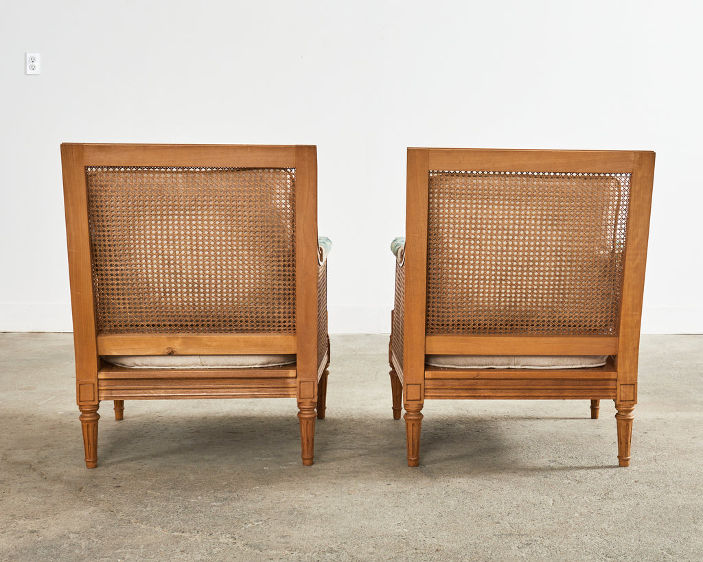 Pair of Louis XVI Style Walnut Caned Needlepoint Lounge Chairs