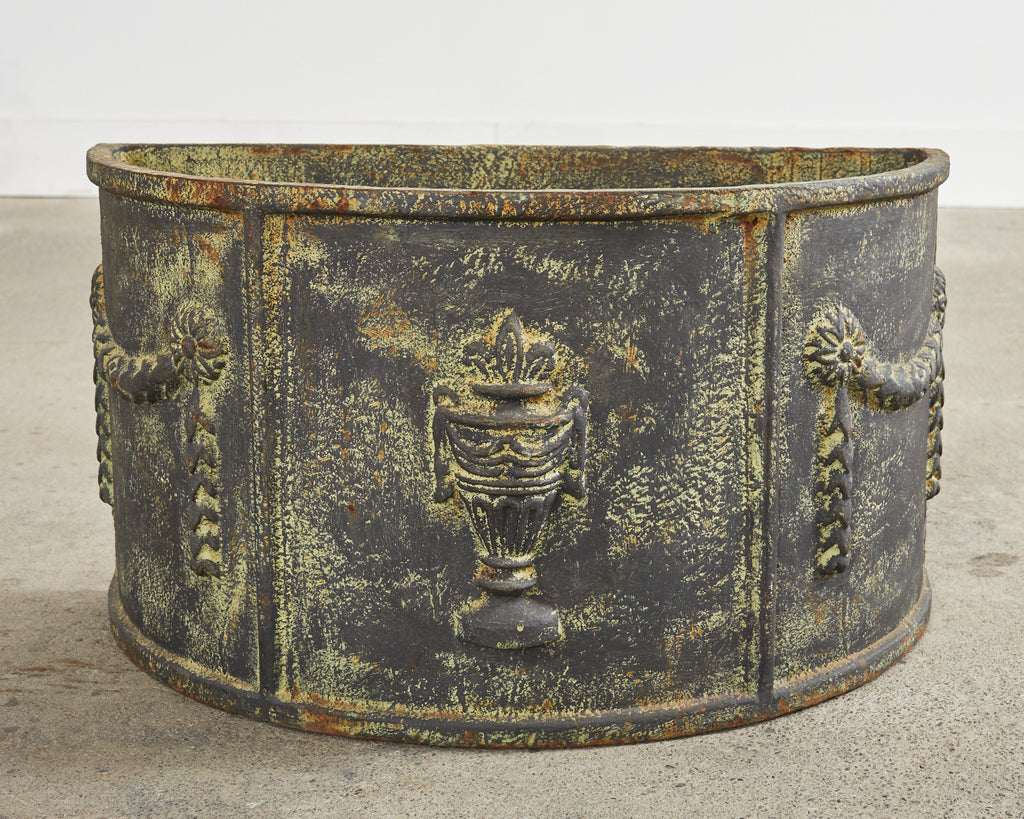 Pair of English Cast Iron Neoclassical Demilune Jardiniere Planters