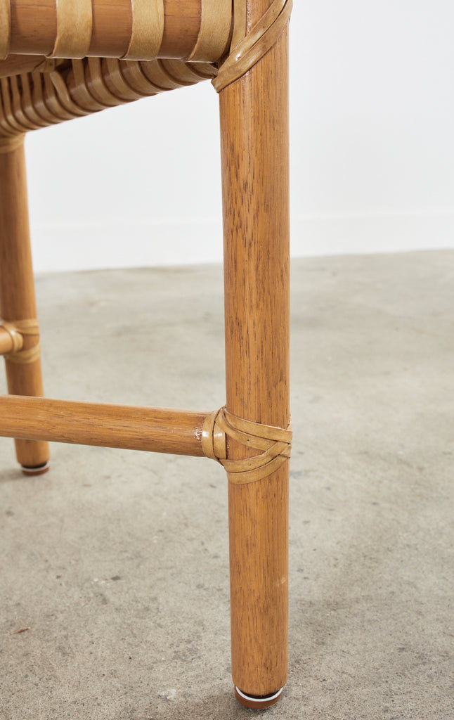 Set of Four McGuire Woven Rawhide Rattan Dining Armchairs