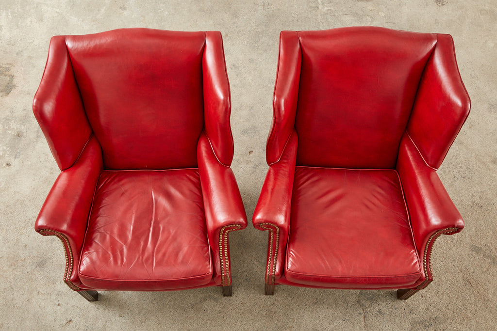 Pair of English Georgian Style Ruby Red Leather Wingback Chairs