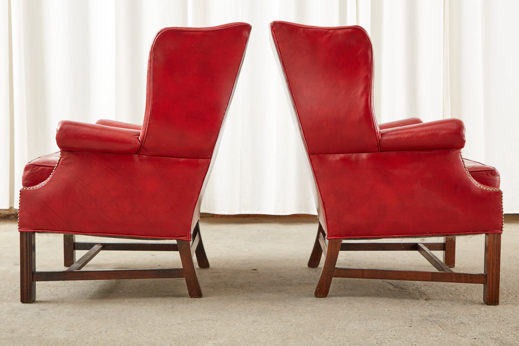 Pair of English Georgian Style Ruby Red Leather Wingback Chairs