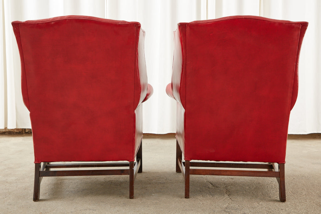 Pair of English Georgian Style Ruby Red Leather Wingback Chairs