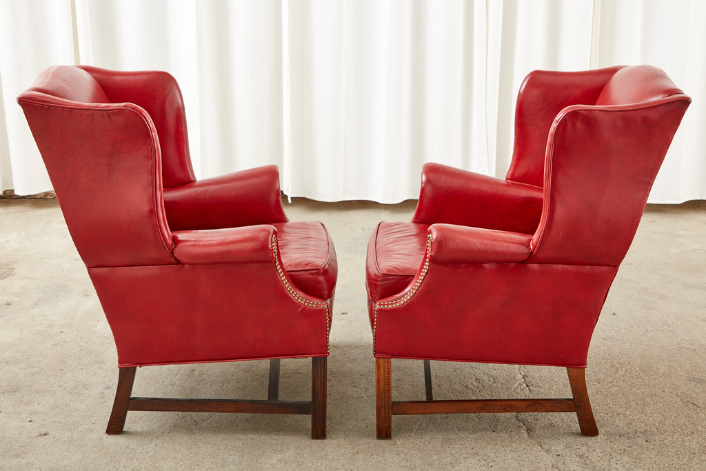 Pair of English Georgian Style Ruby Red Leather Wingback Chairs