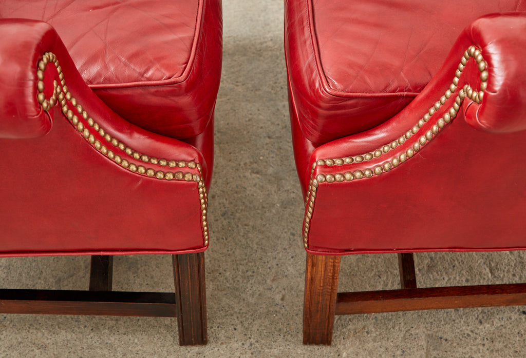 Pair of English Georgian Style Ruby Red Leather Wingback Chairs