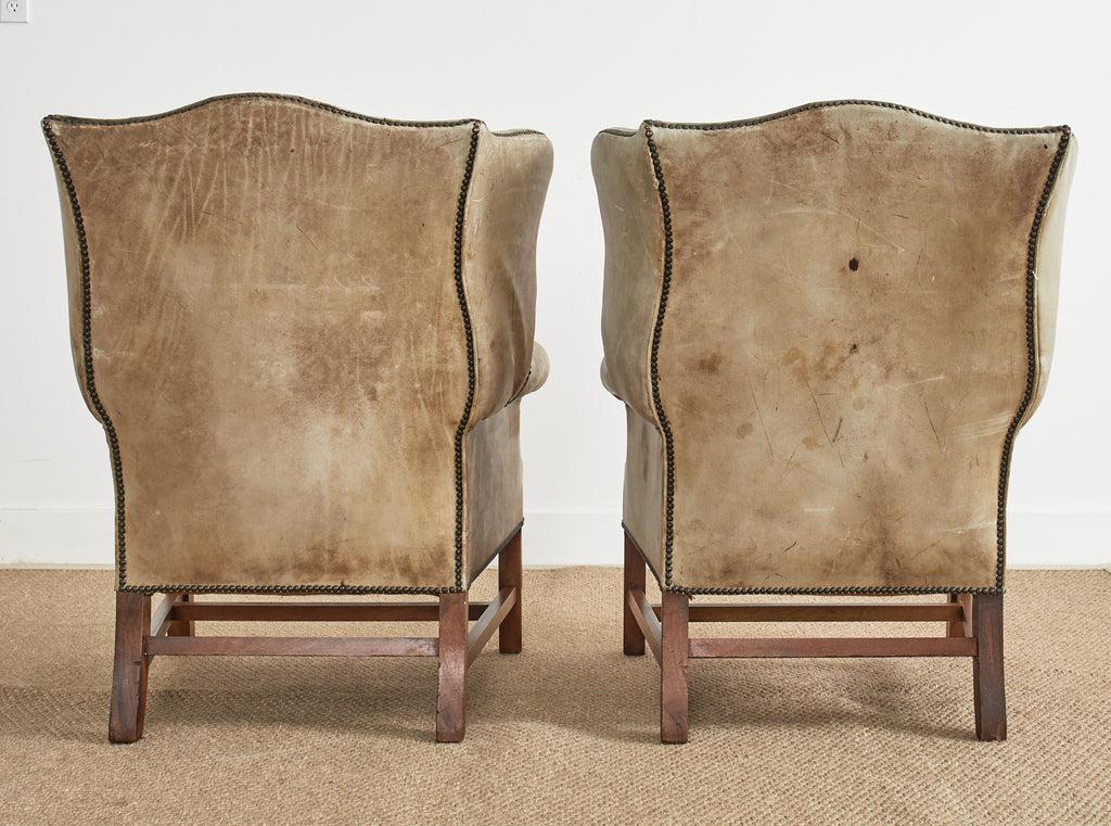 Pair of English Georgian Cigar Leather Wingback Library Chairs