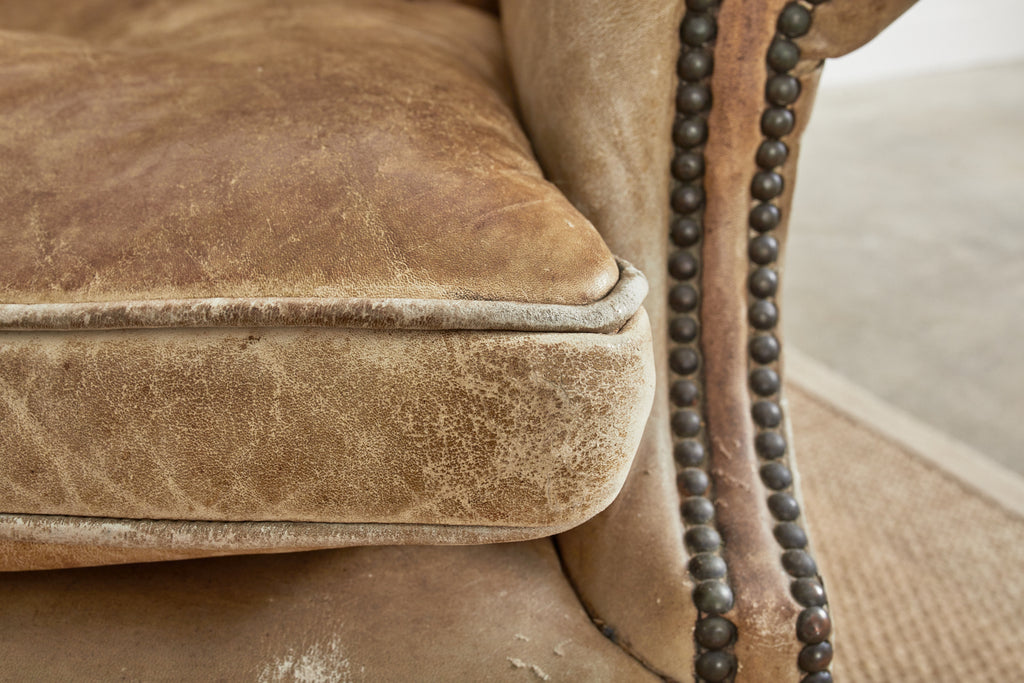 Pair of English Georgian Cigar Leather Wingback Library Chairs